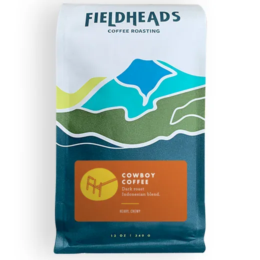 The original Fieldheads Cowboy Coffee package, with blue and green mountain bands that informed the website concept.